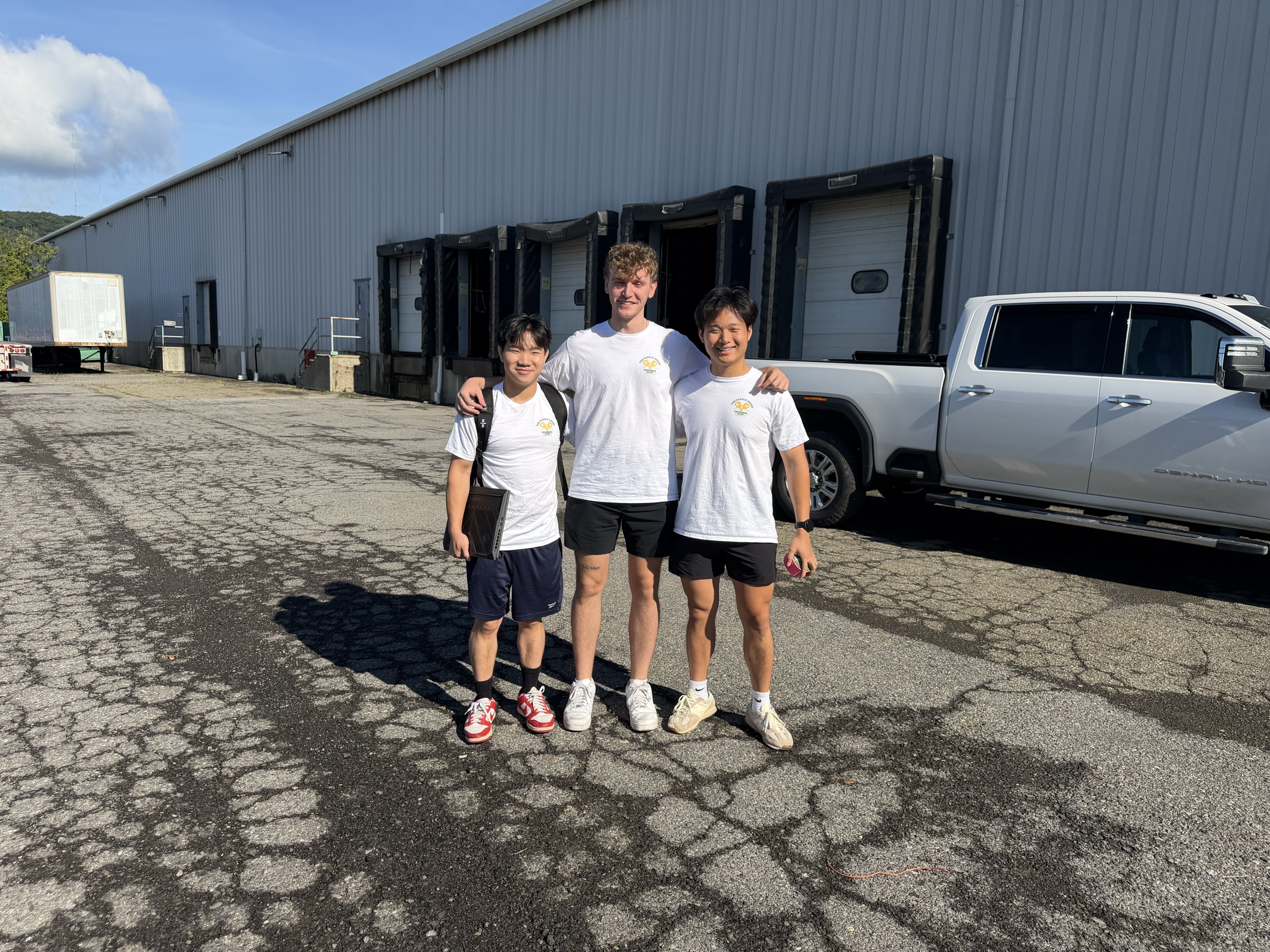 Indoor pickleball facility concept and group photo for The Paddle House in Binghamton, New York
